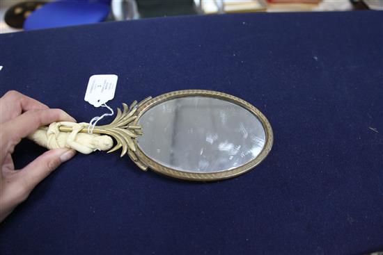 A 19th century French ormolu hand mirror, 12.25in.